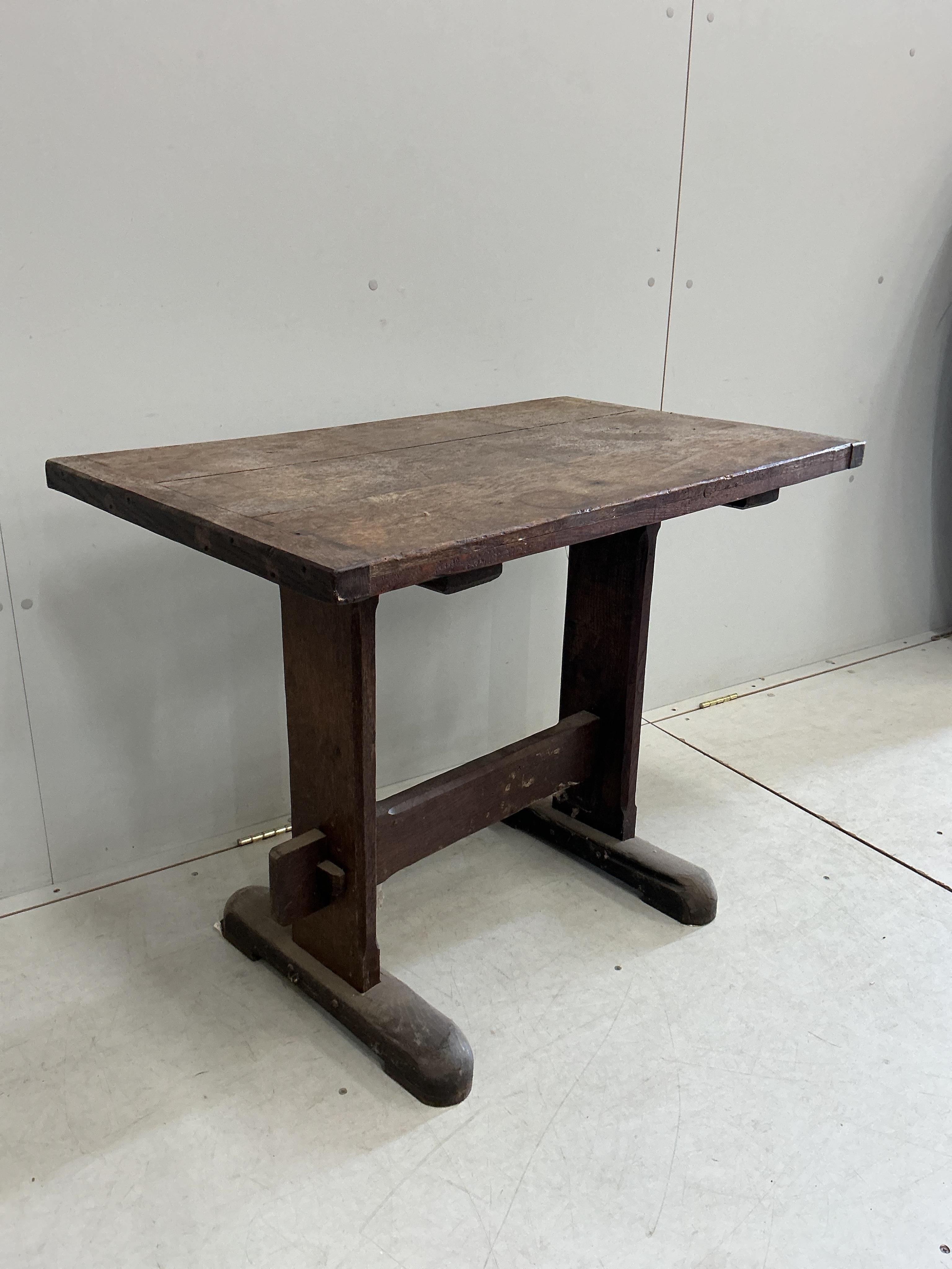 A rectangular oak side table, width 92cm, depth 55cm, height 73cm